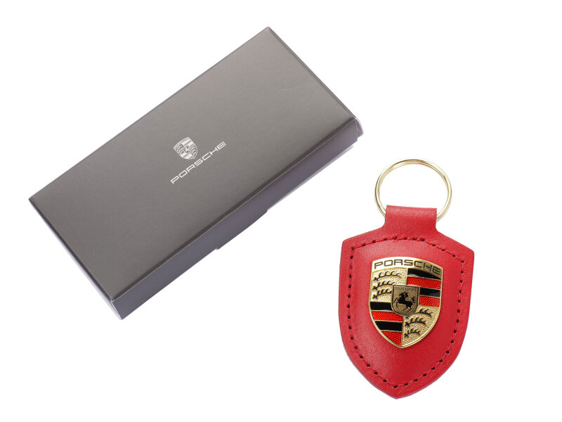 ORIGINELE PORSCHE METALEN ROOD LEDEREN SLEUTELHANGER MET CREST